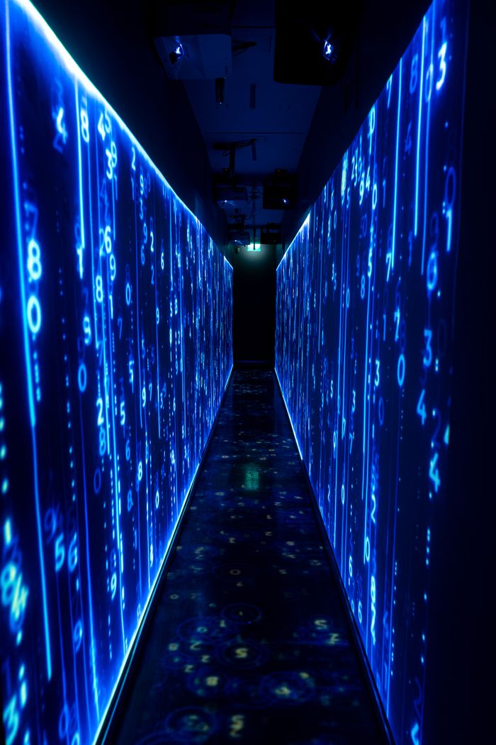 wedding-photography-05 A luminous blue tunnel with digital numbers creating a futuristic, sci-fi ambiance.